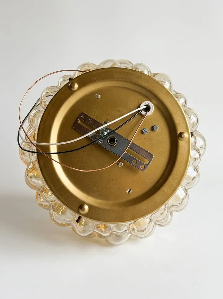 Back of the light: brass-tone backplate, US crossbar mount and black, white and ground wires